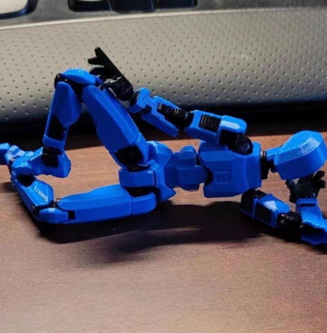 Pomarańczowy ruchomy robot z druku 3D