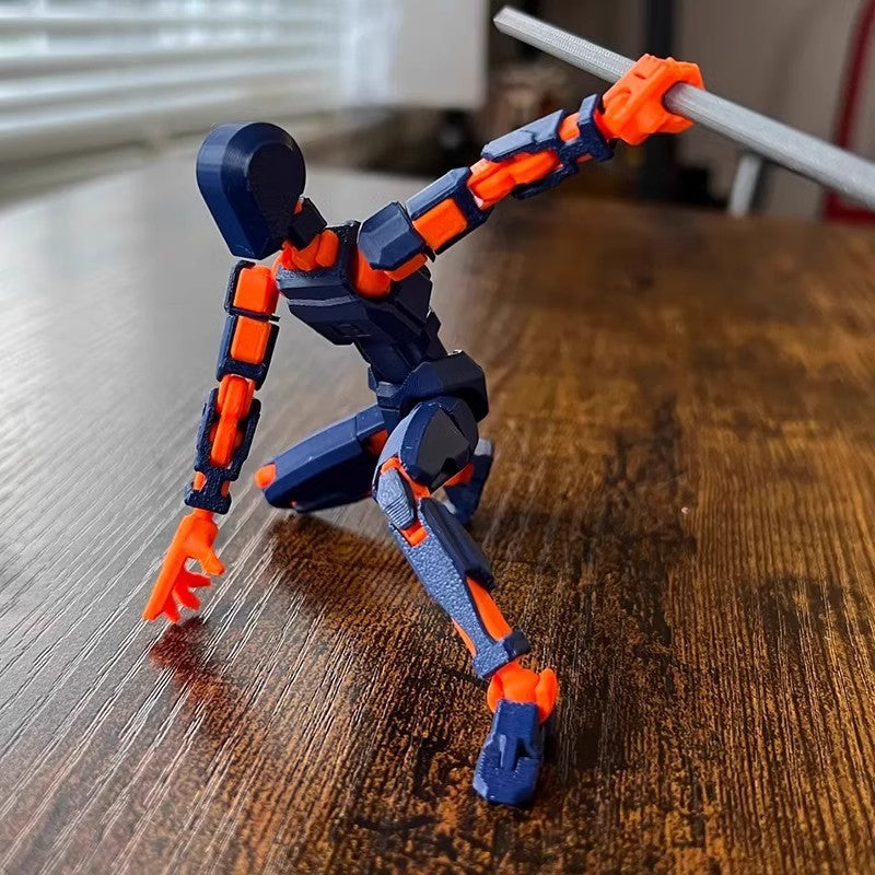 Pomarańczowy ruchomy robot z druku 3D