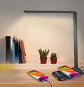 Współczesna regulowana lampa stołowa LED z funkcją ładowania
