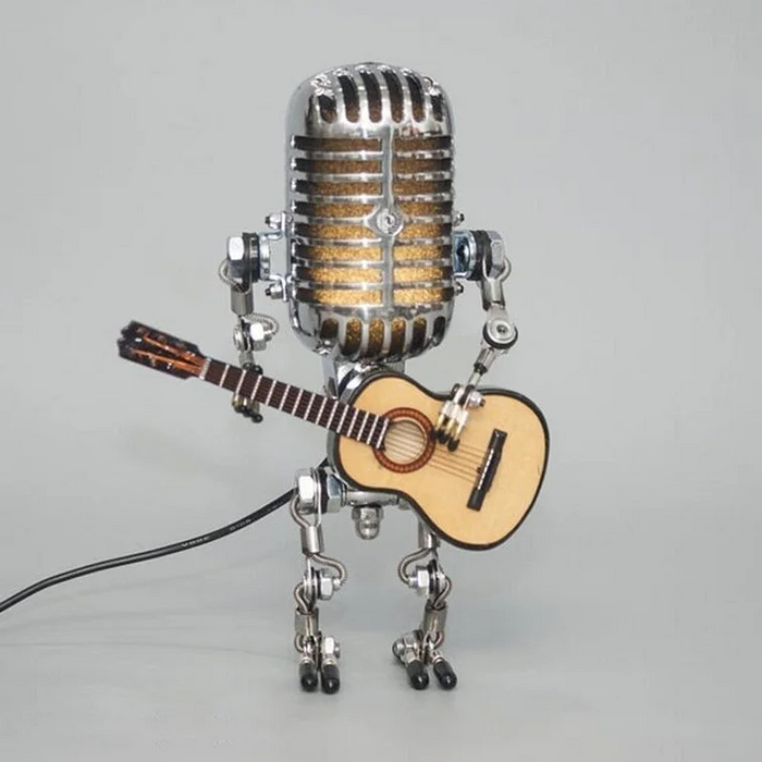 Metalowa lampa stołowa robot vintage z mikrofonem i gitarą, industrialna lampka na biurko